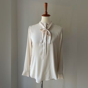 Never worn ivory Ann Taylor blouse with neck tie and gold buttons